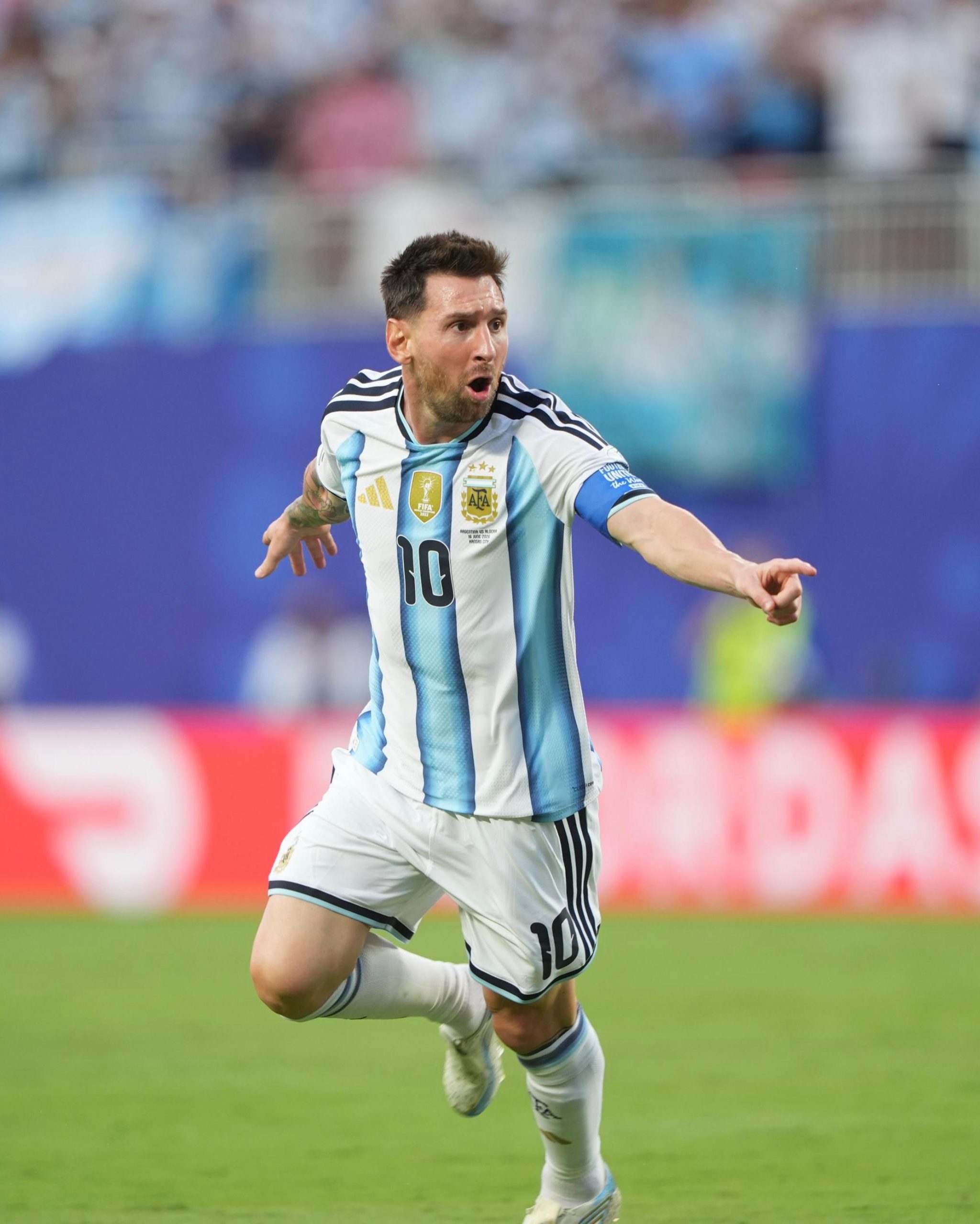 Messi celebrating in Argentina kit
